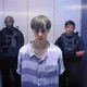 In this image from the video uplink from the detention center to the courtroom, Dylann Roof appears at Centralized Bond Hearing Court June 19, 2015 in North Charleston, South Carolina. Roof is charged with nine counts of murder and firearms charges in the shooting deaths at Emanuel African Methodist Episcopal Church in Charleston, South Carolina on June 17.